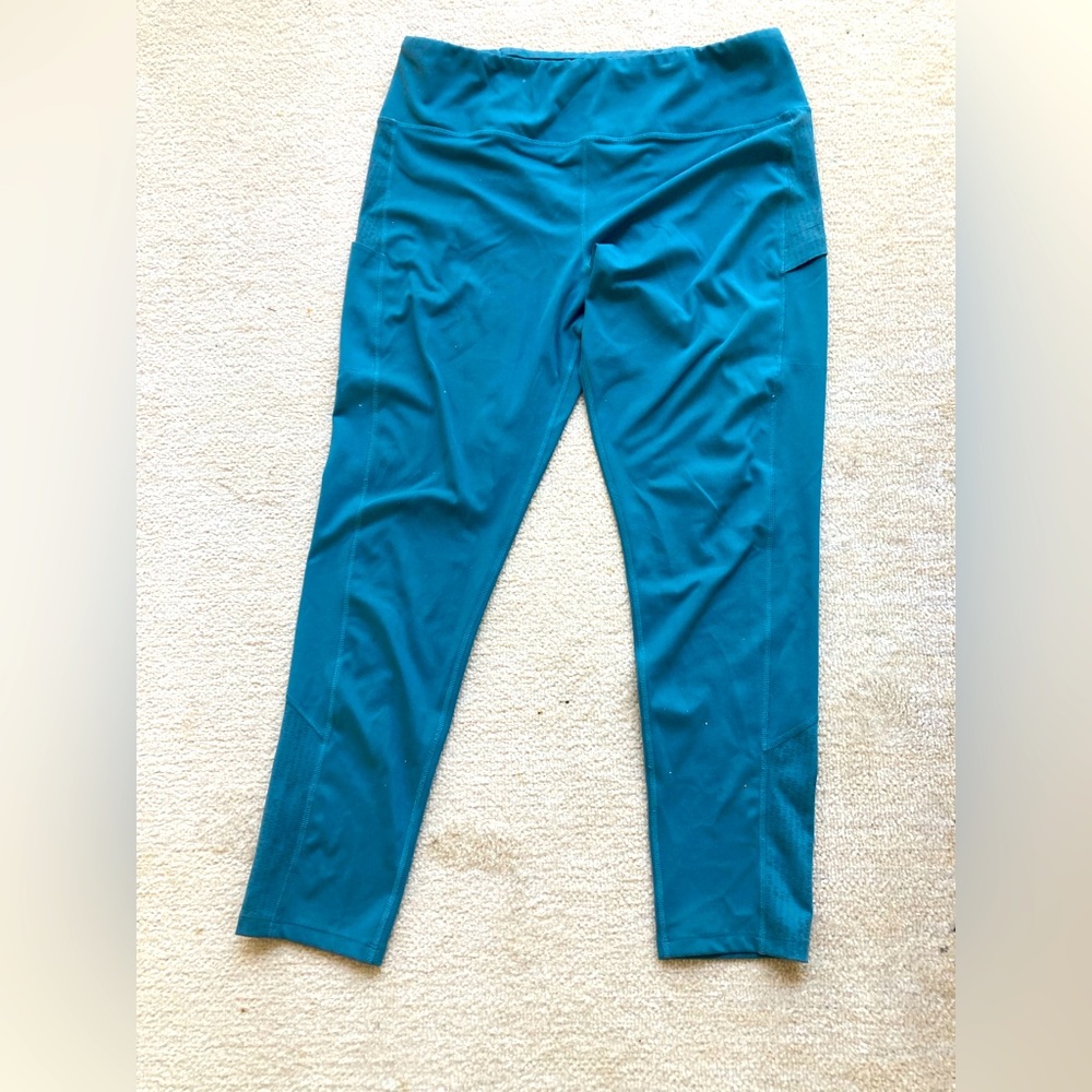 Golite leggings large. Zipper back. Poly spandex in teal blue